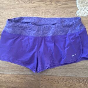 Purple Nike shorts